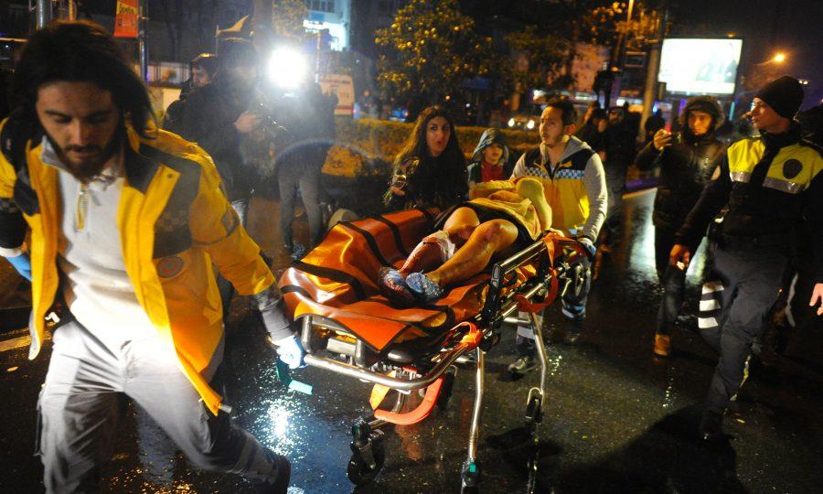 First+aid+officers+carry+an+injured+woman+at+the+site+of+an+armed+attack+on+January+1%2C+2017+in+Istanbul.+At+least+two+people+were+killed+in+an+armed+attack+Saturday+on+an+Istanbul+nightclub+where+people+were+celebrating+the+New+Year%2C+Turkish+television+reports+said.+%2F+AFP+%2F+IHLAS+NEWS+AGENCY+%2F+IHLAS+NEWS+AGENCY