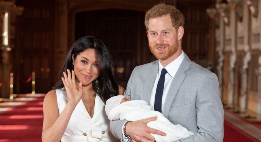 Britains Prince Harry, Duke of Sussex (R), and his wife Meghan, Duchess of Sussex, pose for a photo with their newborn baby son, Archie Harrison Mountbatten-Windsor, in St Georges Hall at Windsor Castle in Windsor, west of London on May 8, 2019. (Photo by Dominic Lipinski / POOL / AFP)        (Photo credit should read DOMINIC LIPINSKI/AFP/Getty Images)