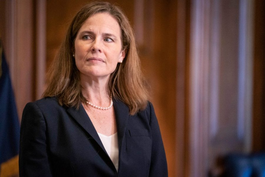 WASHINGTON, DC - OCTOBER 21: Supreme Court nominee Judge Amy Coney Barrett meets with U.S. Sen. James Lankford (R-OK) on October 21, 2020 in Washington, DC. President Donald Trump nominated Barrett to replace Justice Ruth Bader Ginsburg after her death. (Photo by Sarah Silbiger-Pool/Getty Images)